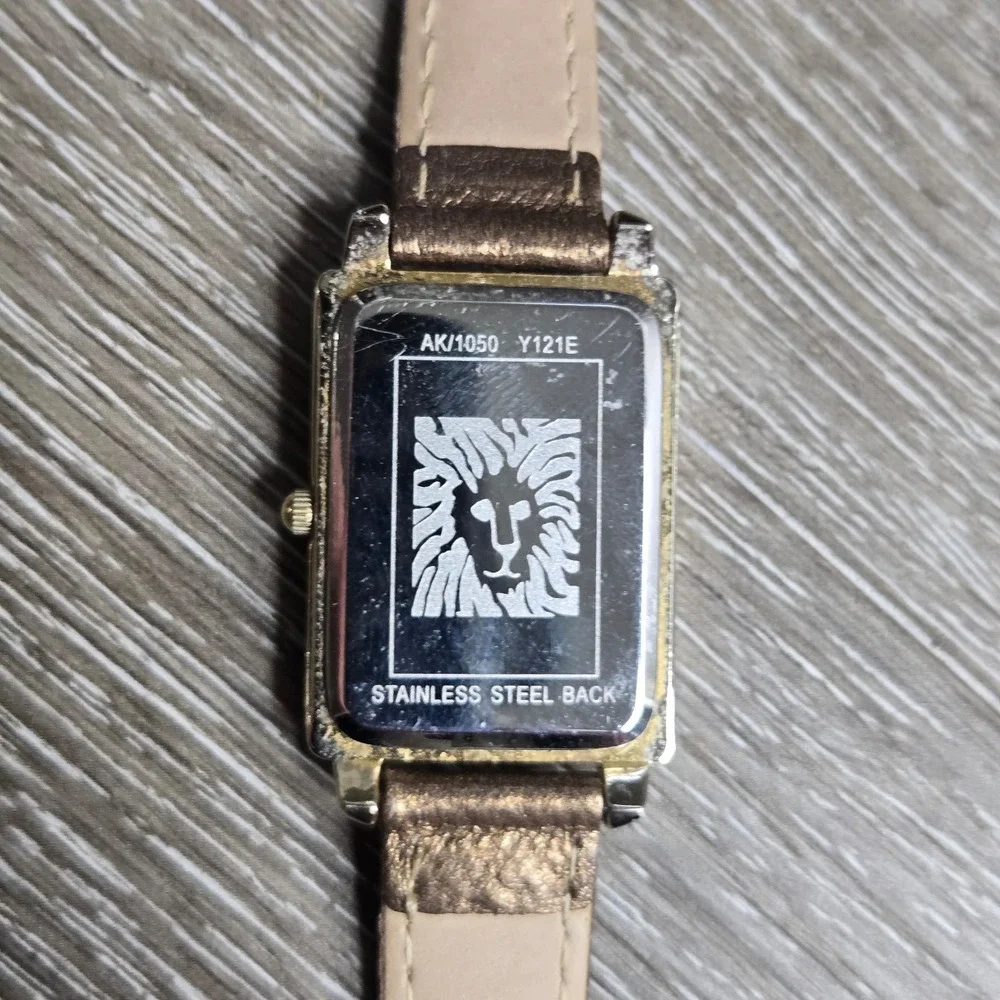 Anne Klein Women's Watch Bronze Dial Gold Tone Crystal Bezel AK/1050 Brown Works